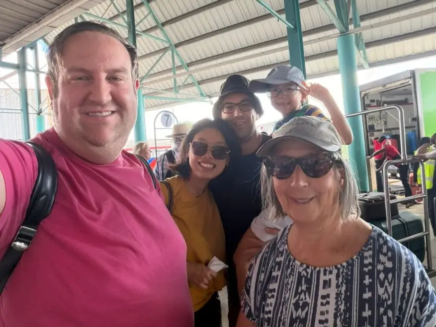 Author David Morris and his family smiling