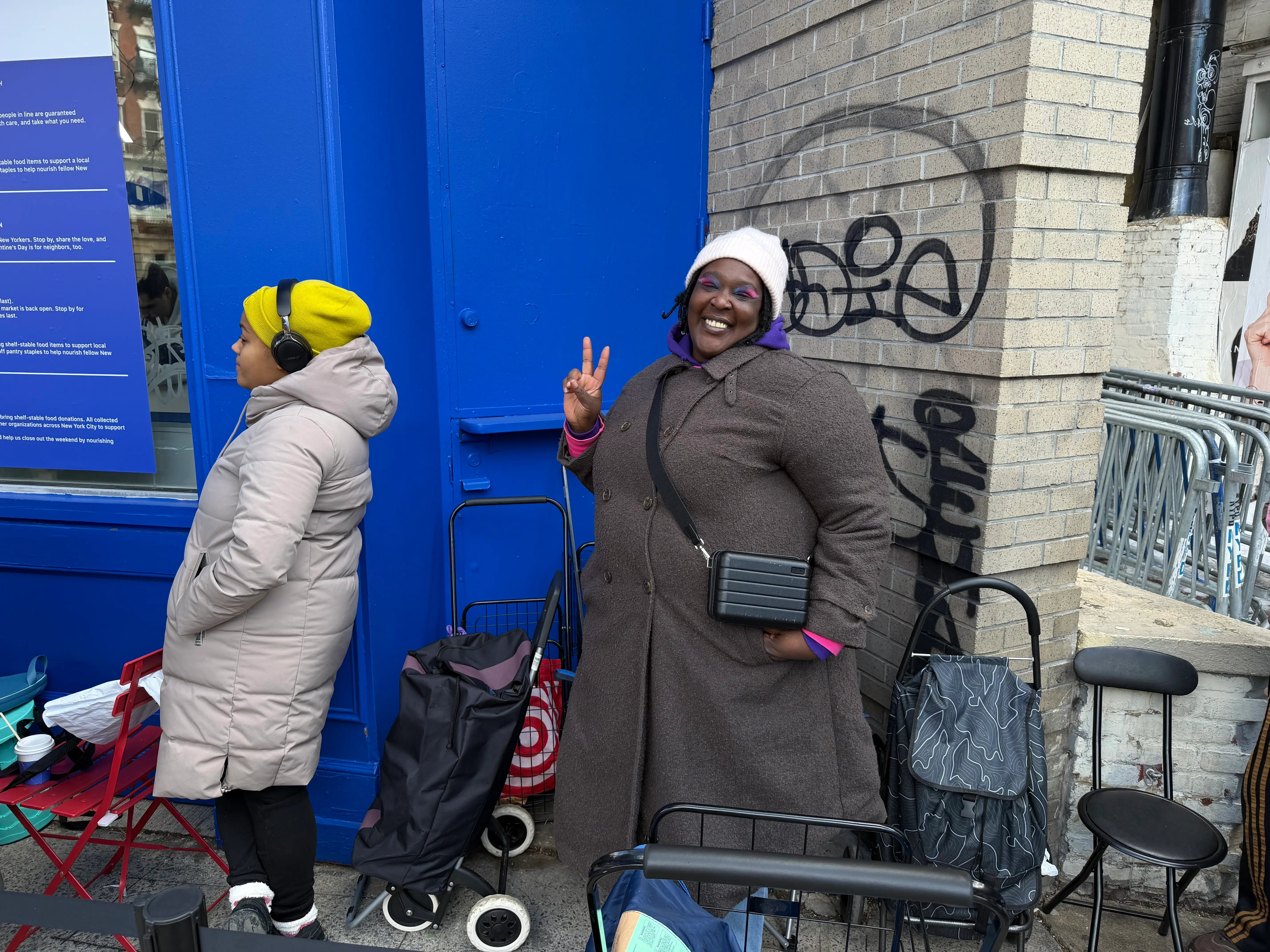 Milla Jackson is pictured waiting in line for the Polymarket