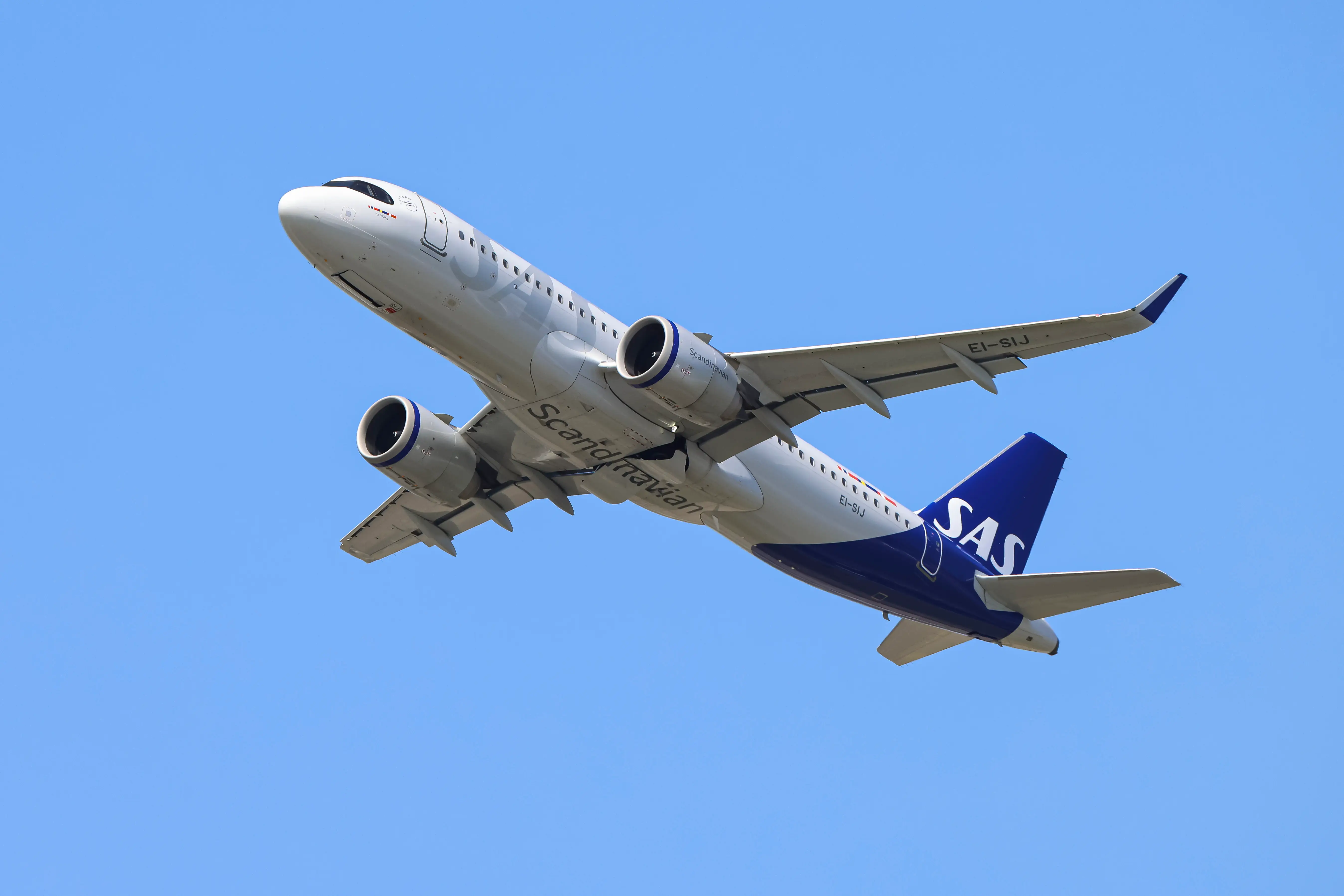 Airbus A320NEO aircraft of SAS Connect spotted flying in the air, departing from Amsterdam Schiphol AMS airport.