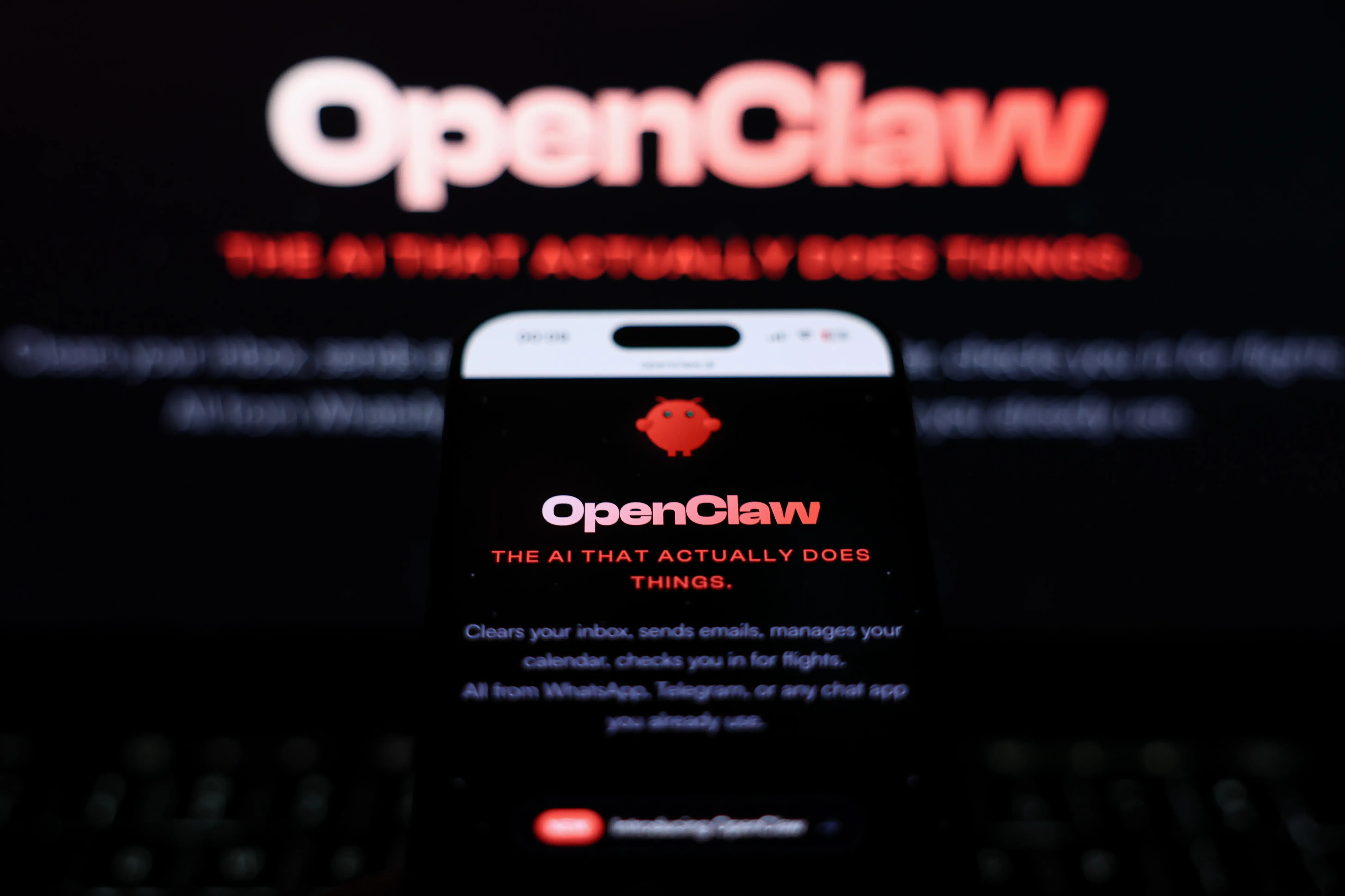 OpenClaw website displayed on a laptop screen and OpenClaw website displayed on a phone screen are seen in this illustration photo taken in Krakow, Poland on February 6, 2026. (Photo by Jakub Porzycki/NurPhoto via Getty Images)
