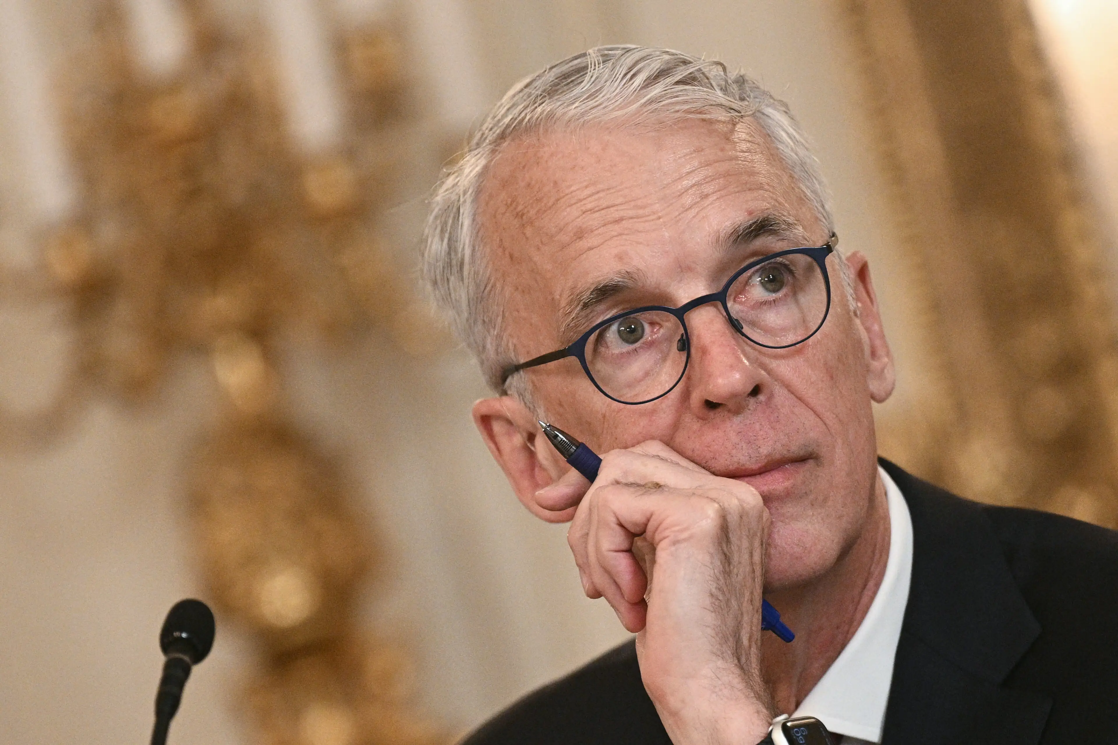 Parker Harris with his hand on his chin