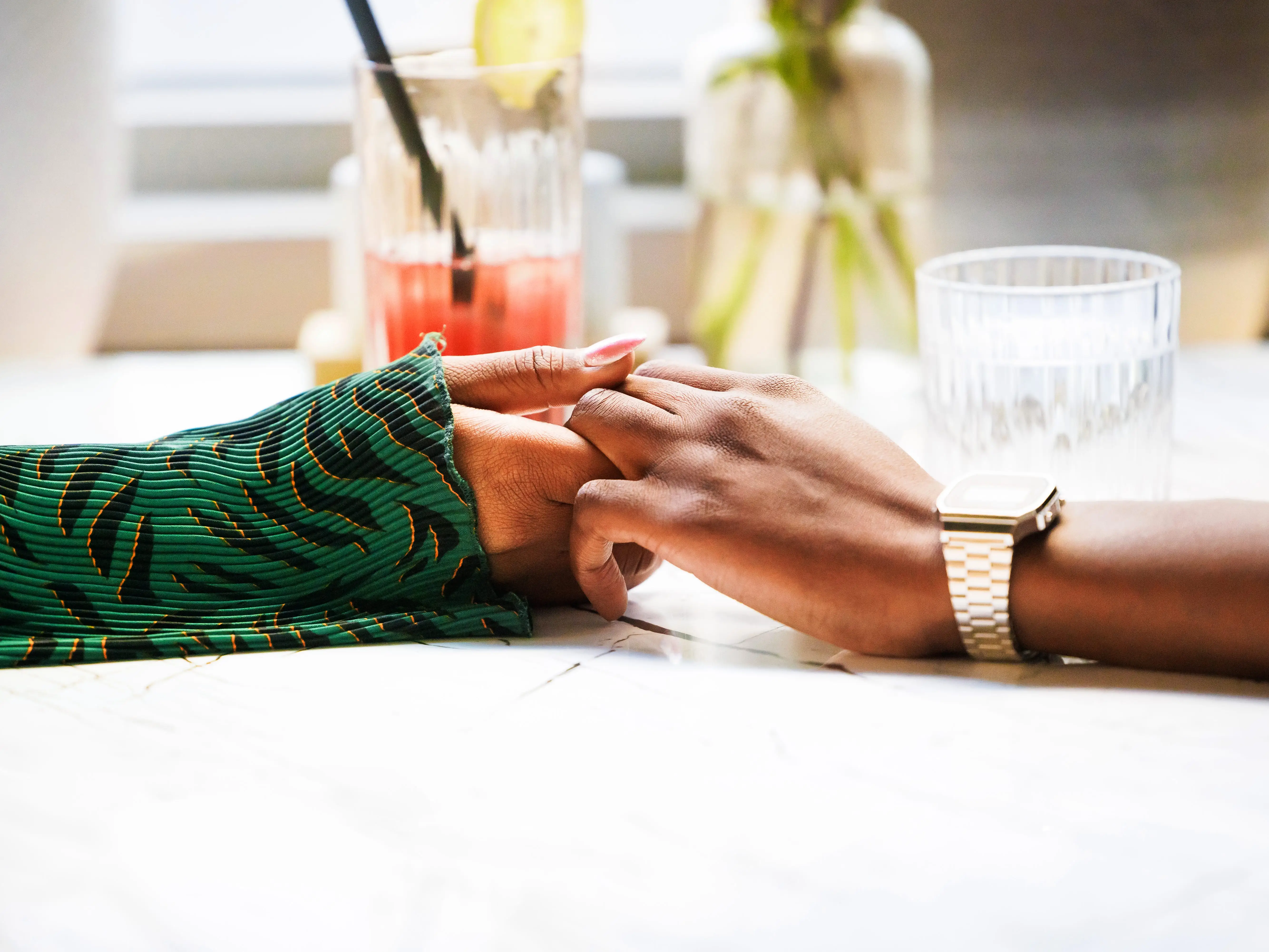 Couple holding hands