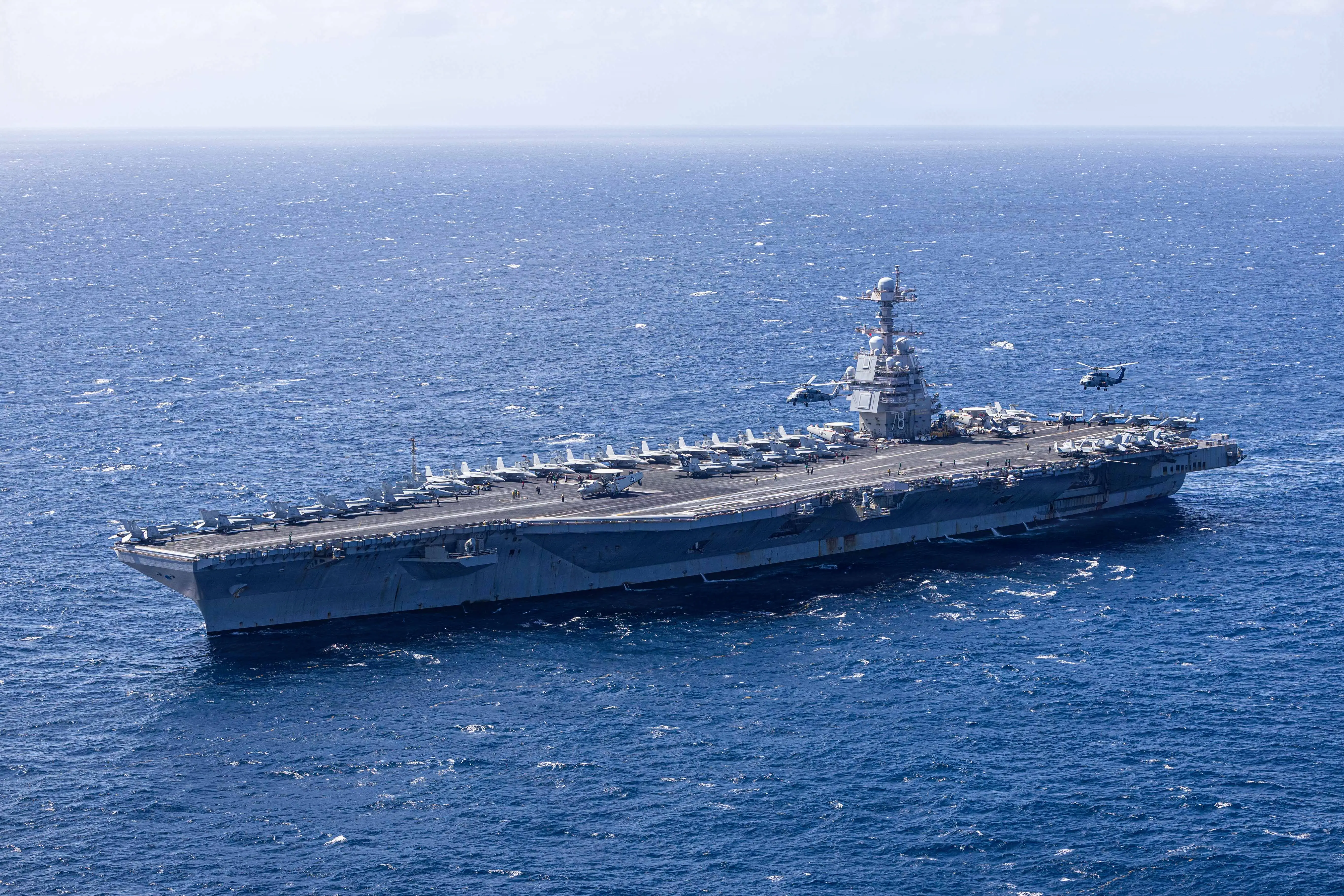 The world's largest aircraft carrier, Ford-class aircraft carrier USS Gerald R. Ford (CVN 78), transits the Caribbean Sea during Carrier Air Wing 8's aerial change of command ceremony, Jan. 19, 2026.