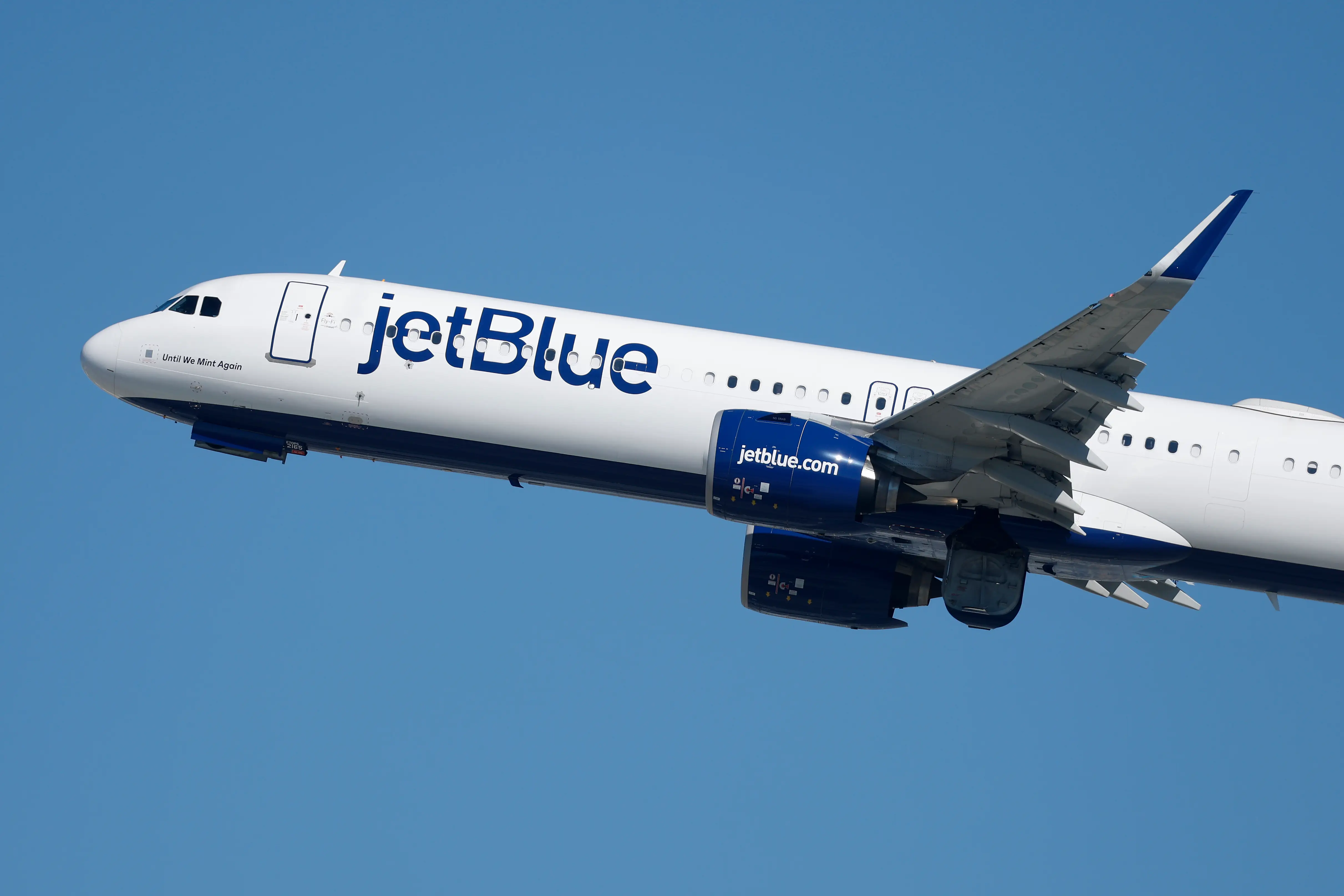 A JetBlue Airways Airbus A321 airplane departs from Los Angeles International Airport en route to New York on October 17, 2025 in Los Angeles, California.