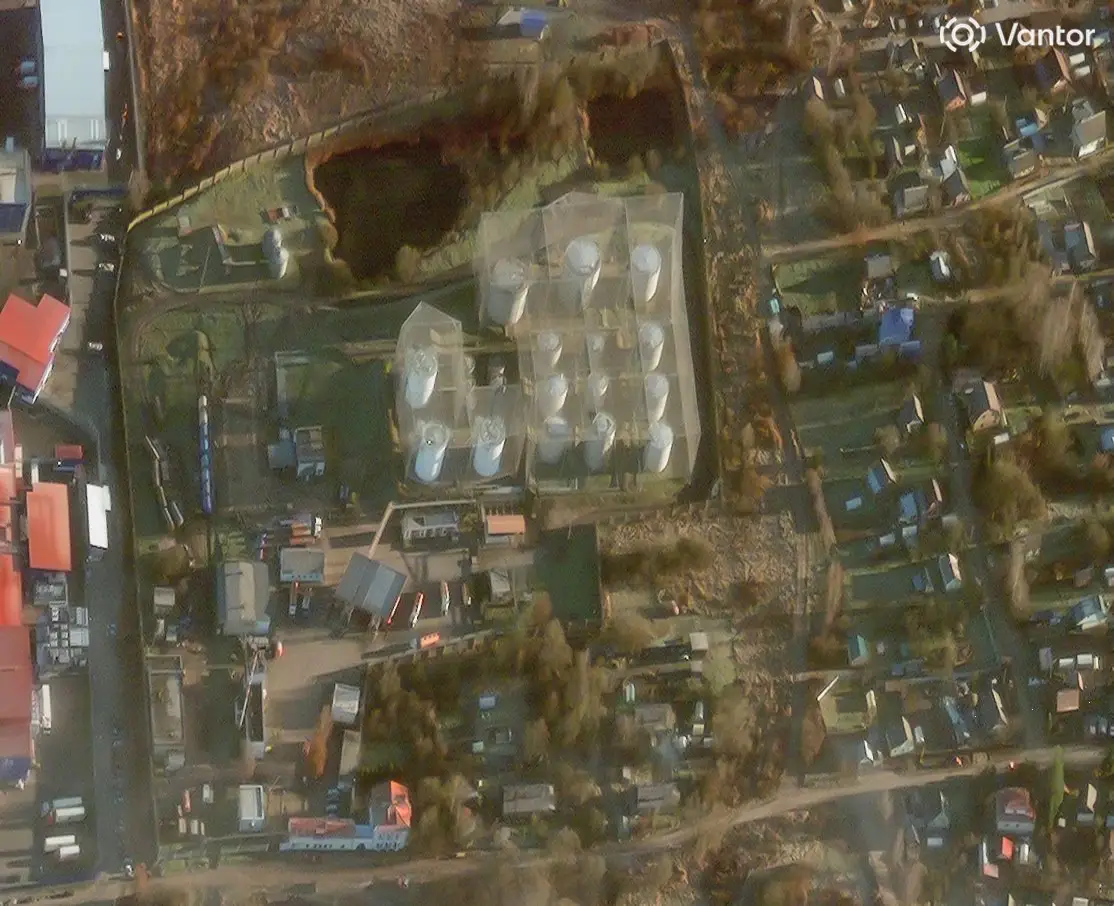 A close-up view of anti-drone netting covering tanks at an oil depot in Velikiye Luki, Russia, in December 2025.