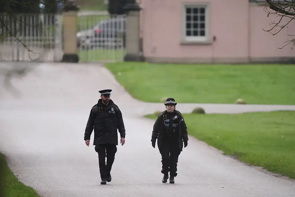 Police outside Andrew Mountbatten-Windsor's former home in Windsor, Berkshire.