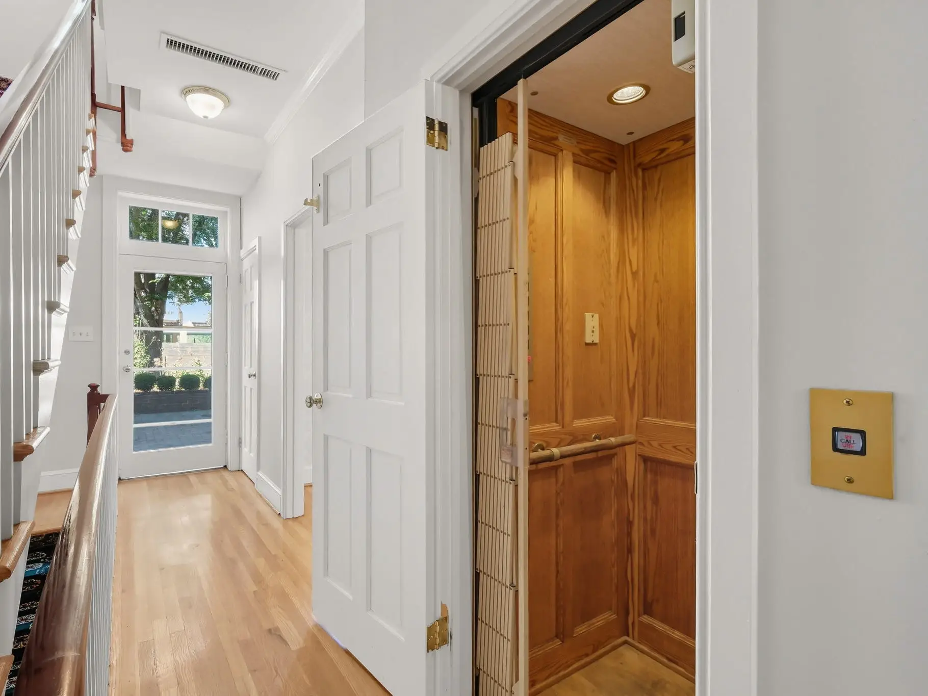 An elevator in a hallway.