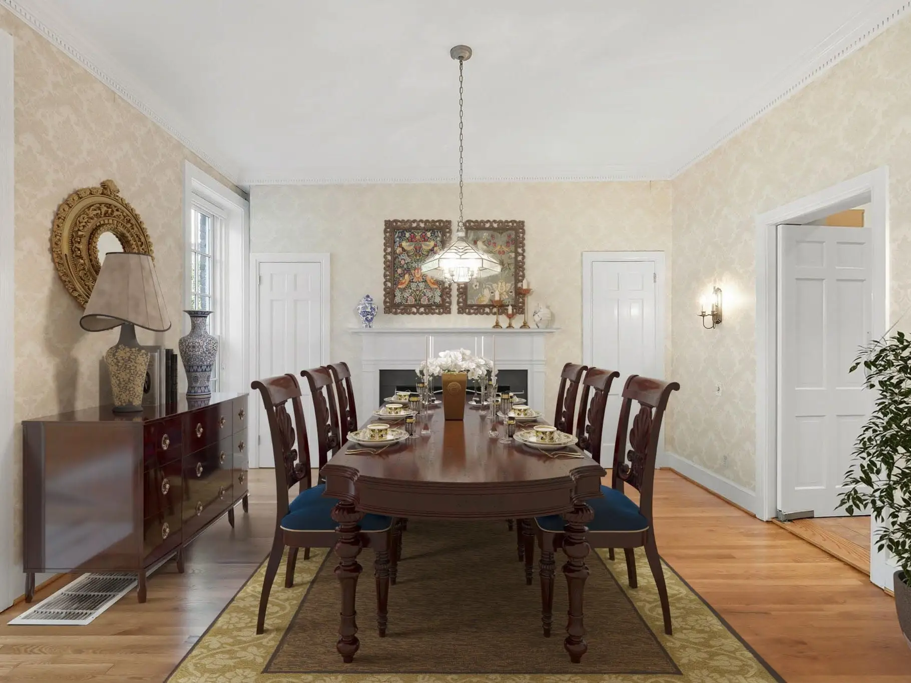 A dining table with chairs under a low-hanging chandelier.