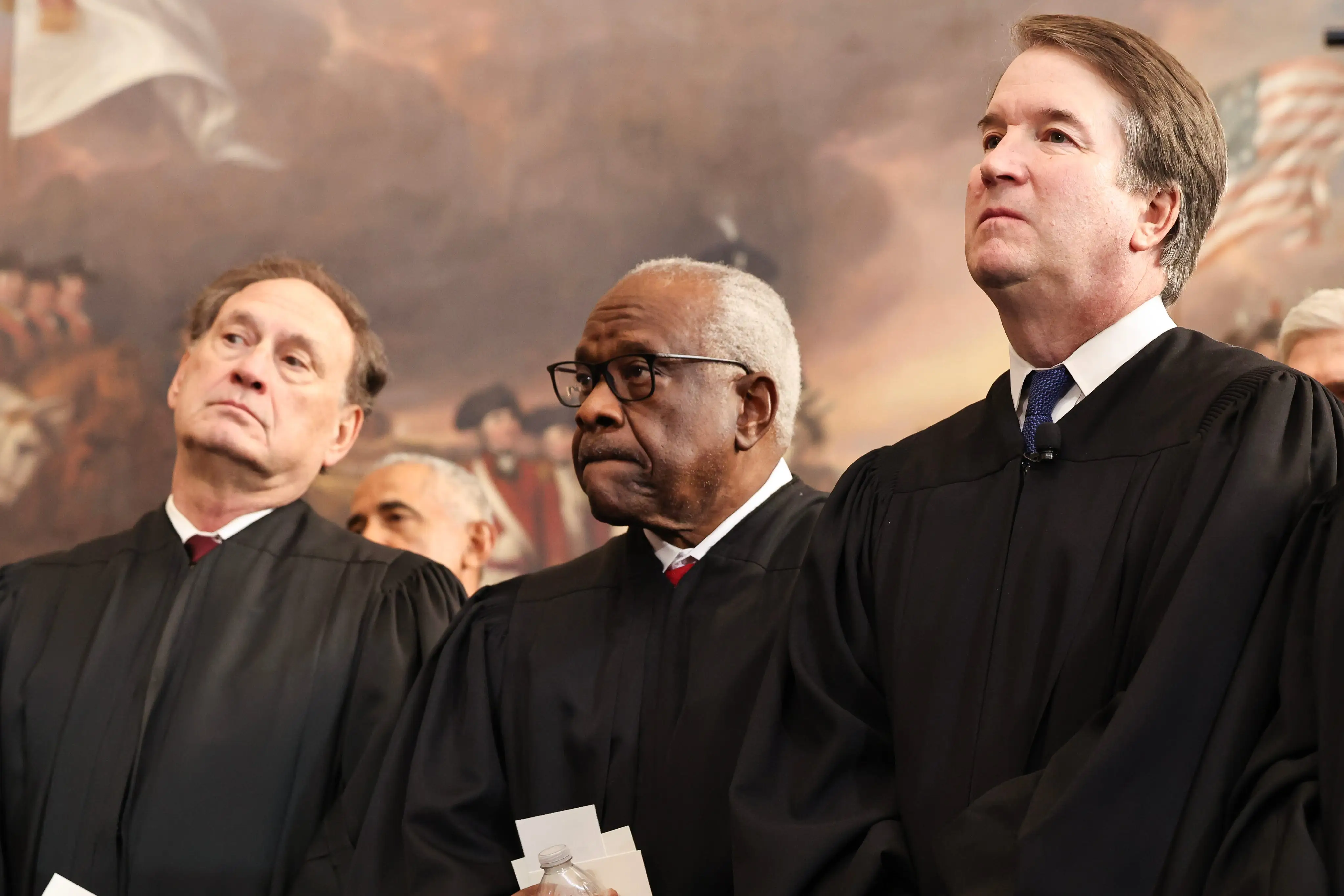 Supreme Court Justices Samuel Alito, Jr., Clarence Thomas and Brett Kavanaugh and U.S. Supreme Court Chief Justice John Roberts.