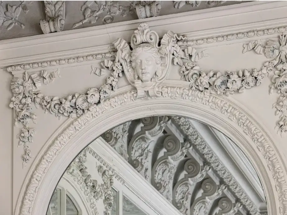 Garlands of plasterwork roses ring the second floor's sunny drawing room.