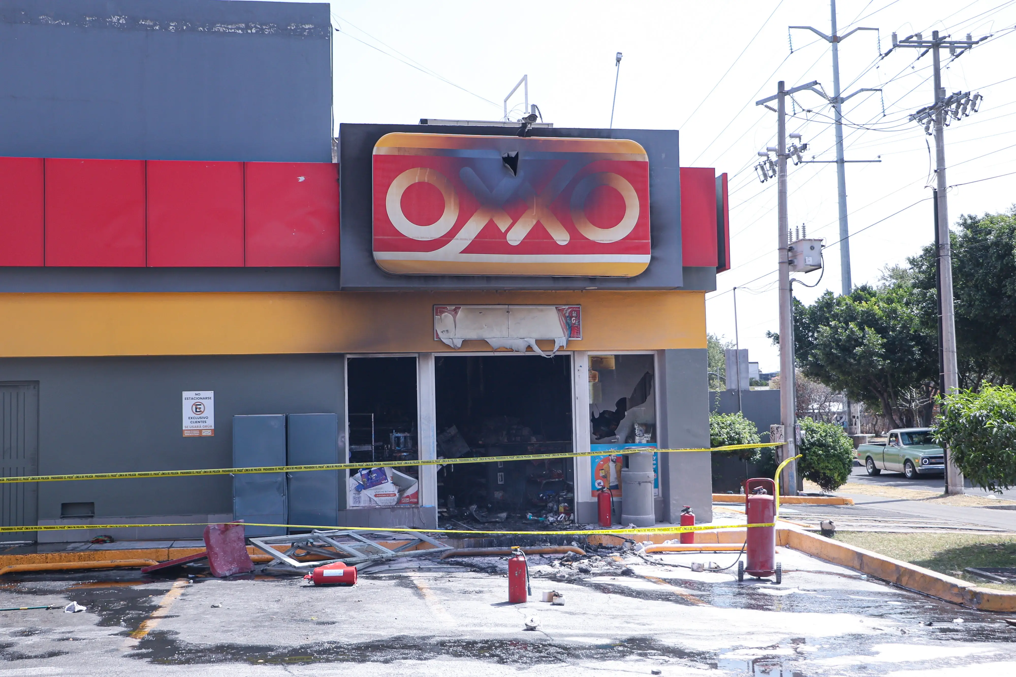 A general view of a burnt and closed entrance of a store on February 22, 2026 in Zapopan, Mexico.