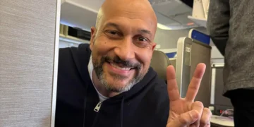 Someone asked to switch our business seats on a plane. I said yes, and got to take photos with one of my favorite celebrities.