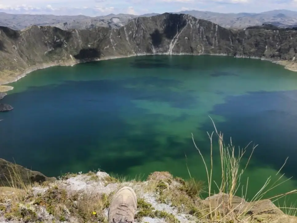 The view of turquoise water from a Quilotoa hike.