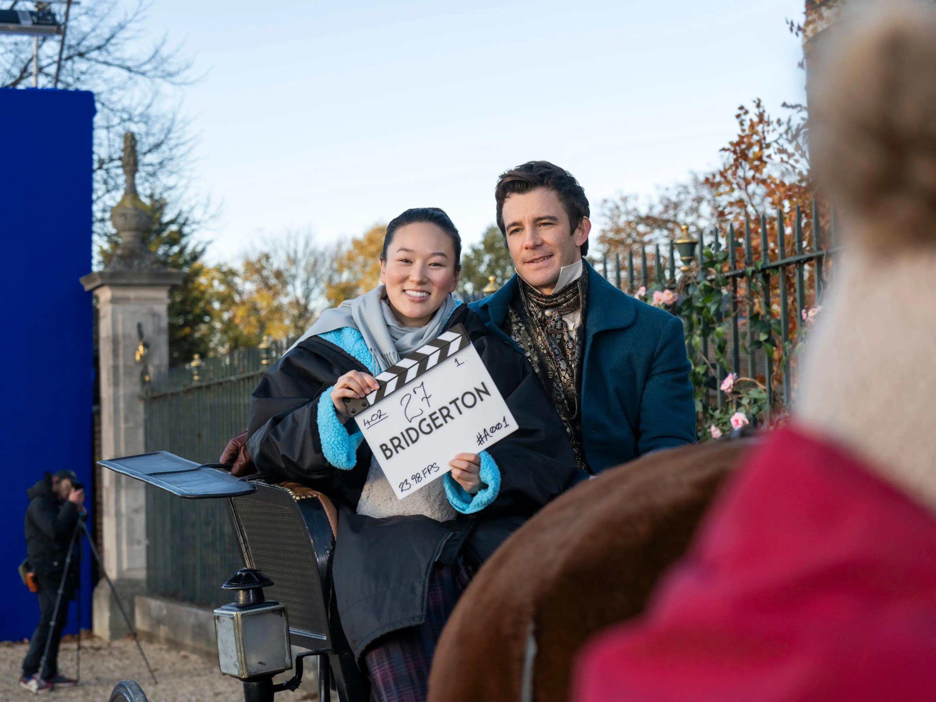 Yerin Ha and Luke Thompson on the set of 