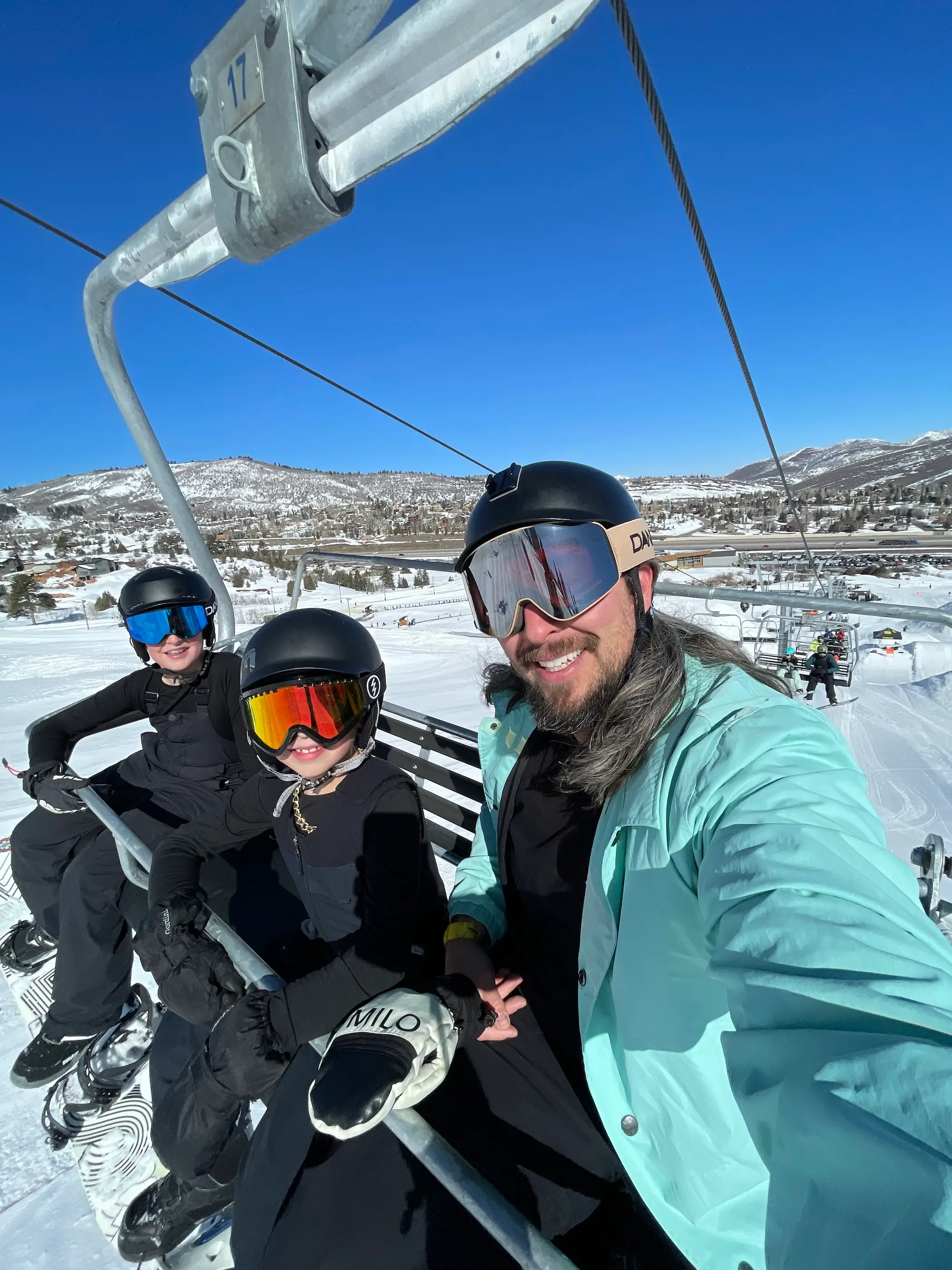 mark and kids snowboard
