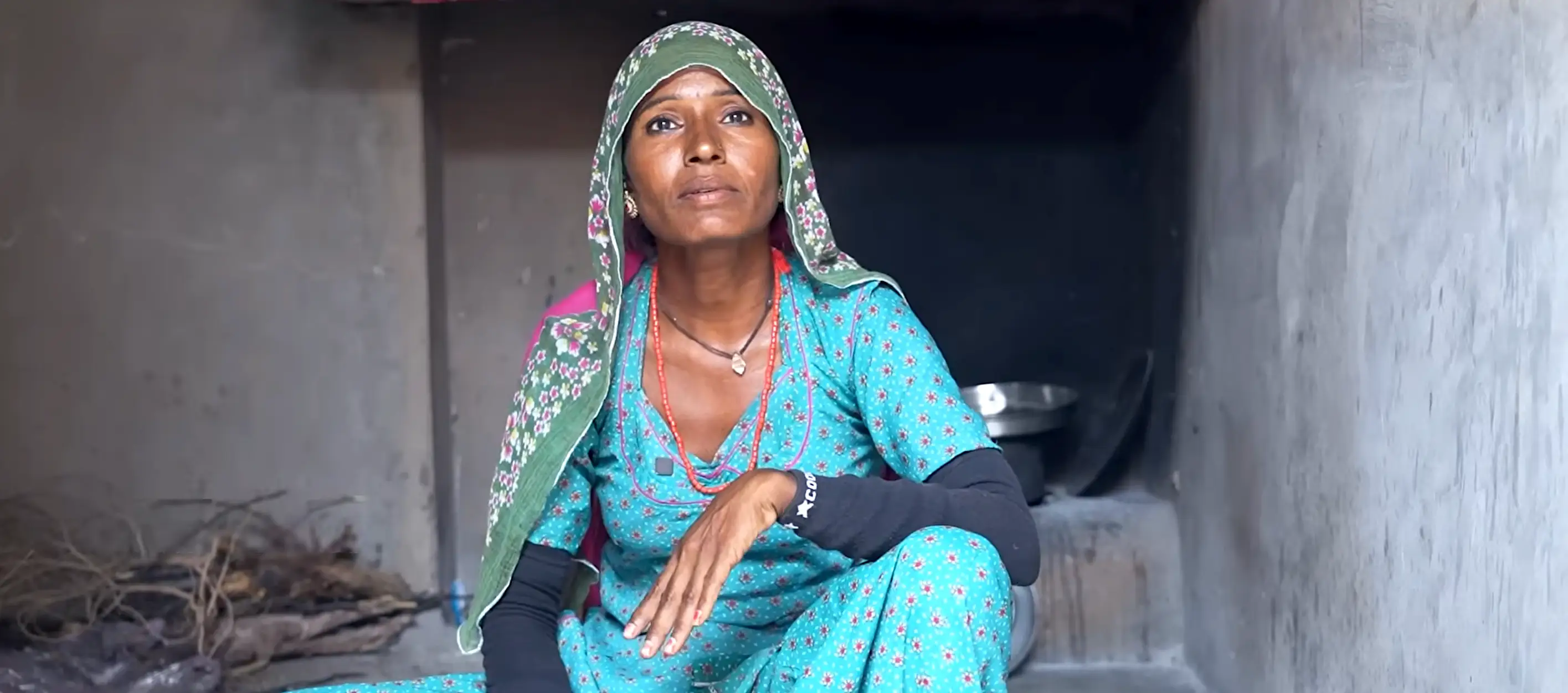 Photo of Bimla in light blue dress.