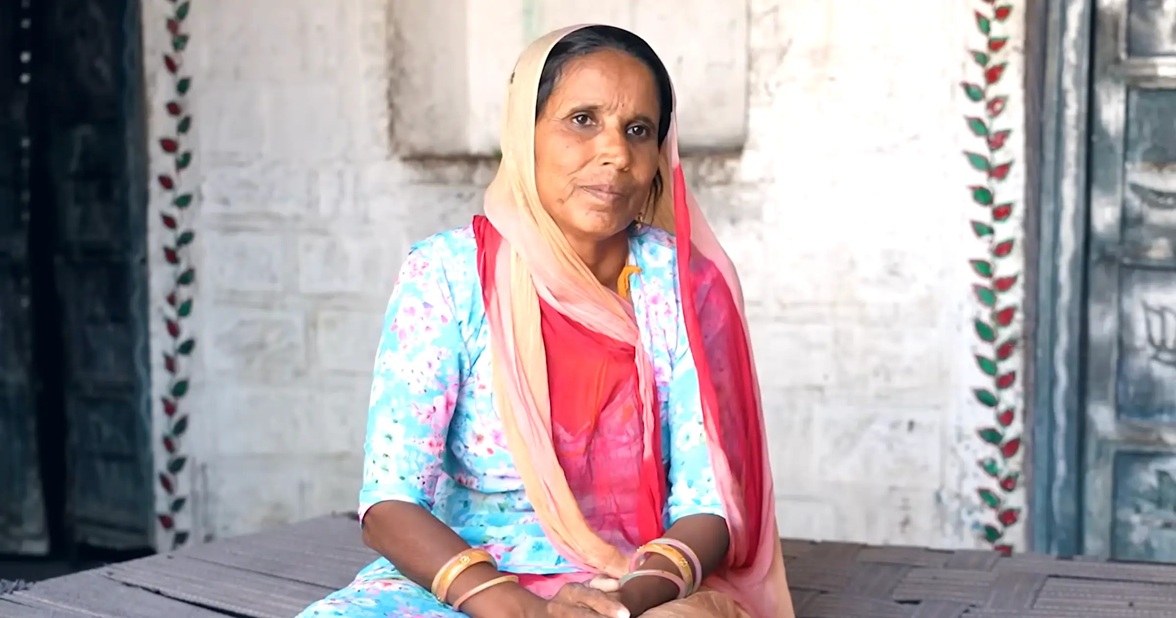 Sapna in colorful blue dress.