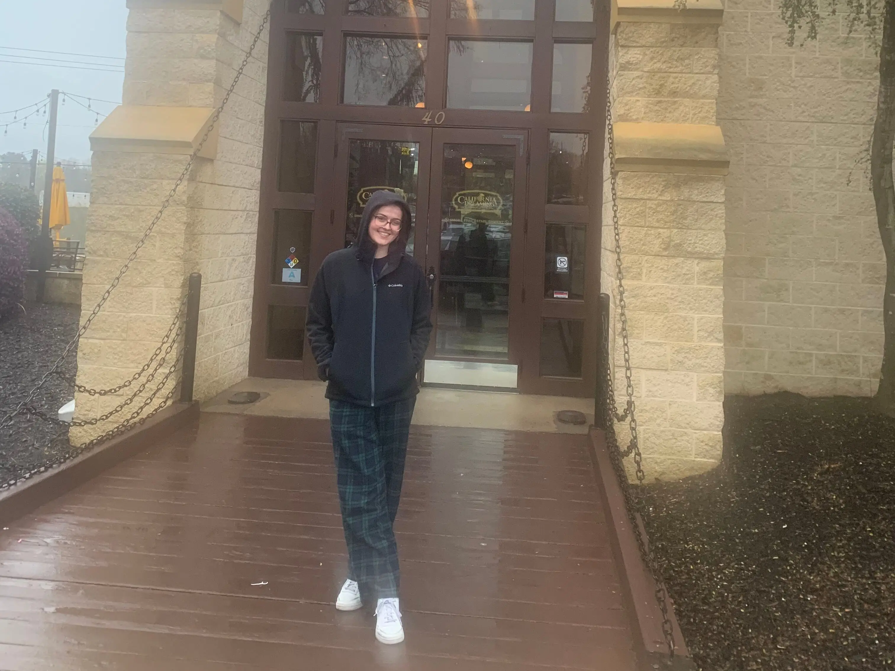 Girl standing at California Dreamin Castle restaurant