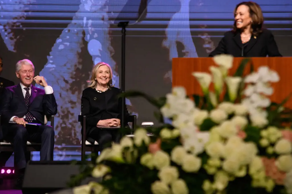 Bill Clinton and Hillary Clinton with Kamala Harris.