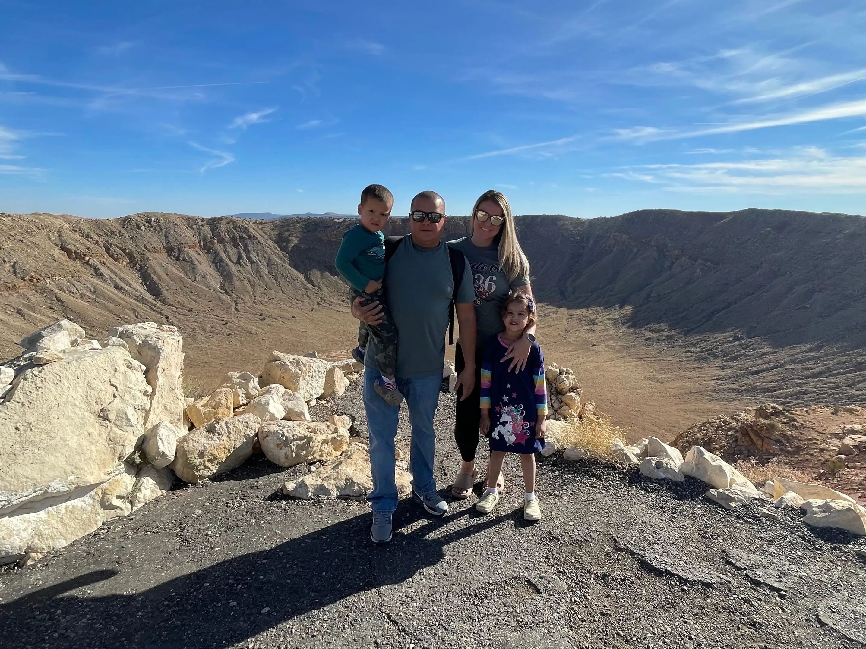 Izabela Oquendo and her husband and children in Arizona.