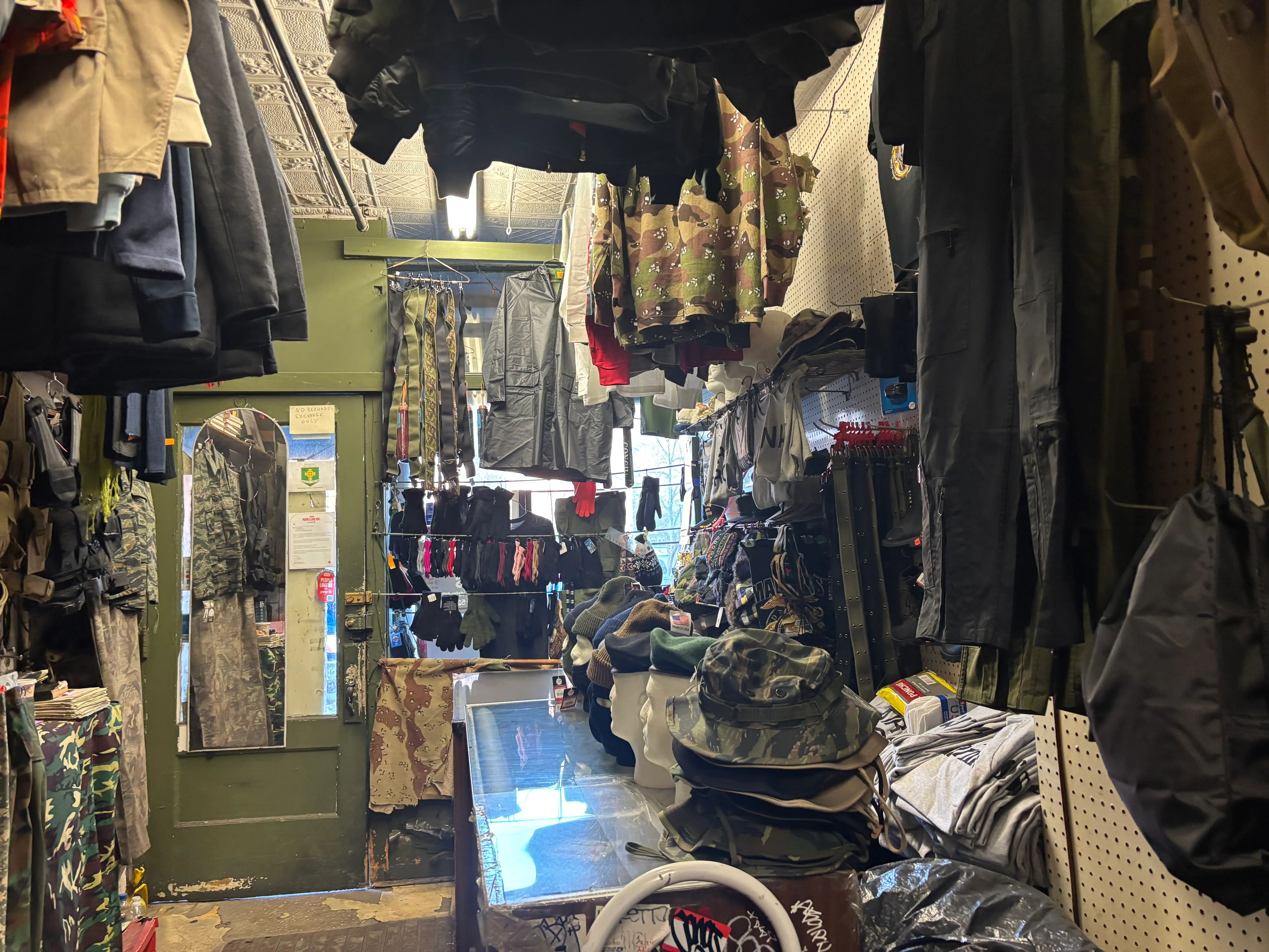 military surplus store army & navy bags from inside