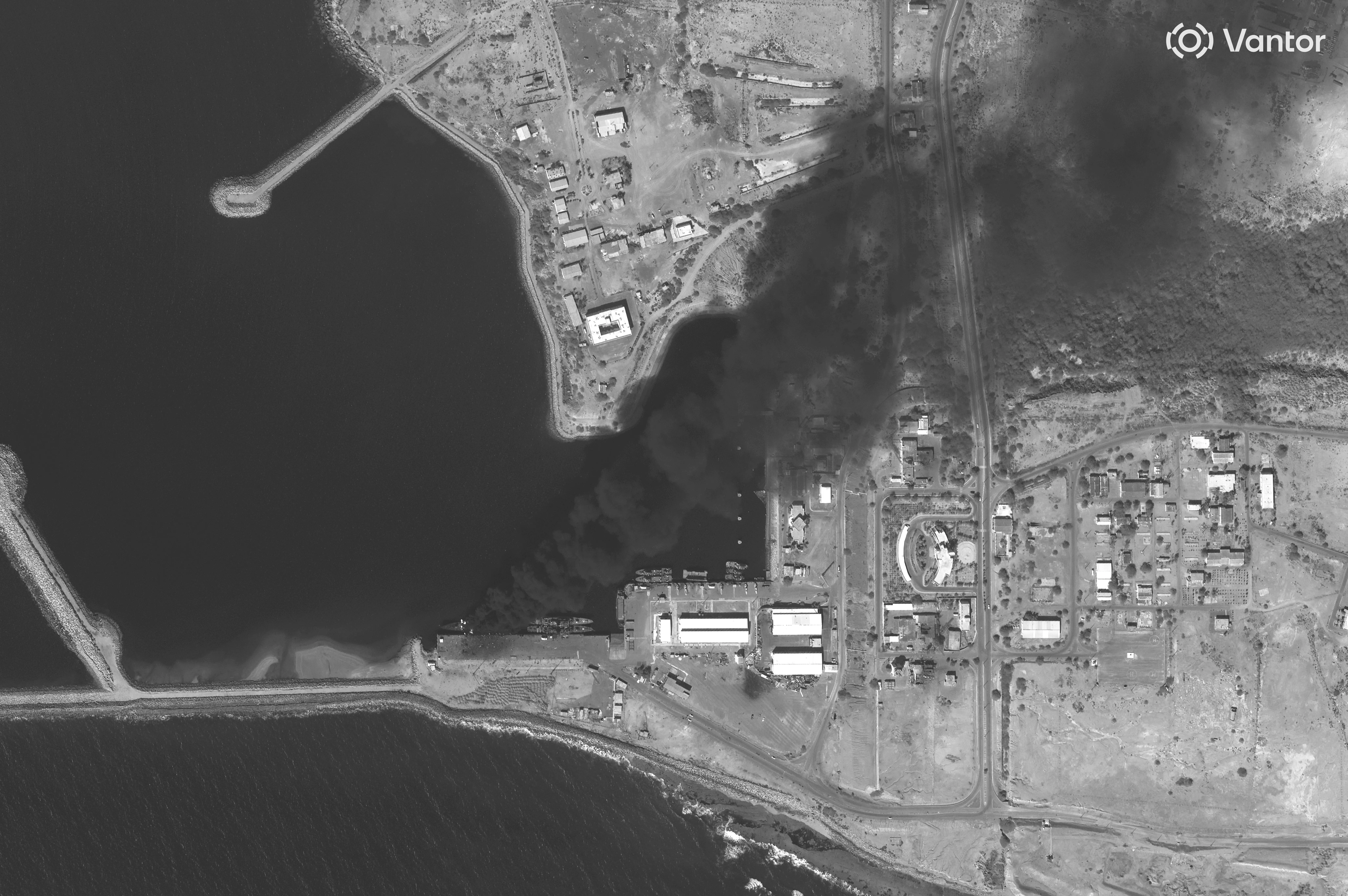 Overview of a burning vessel at Iran's Konarak naval base on February 28.