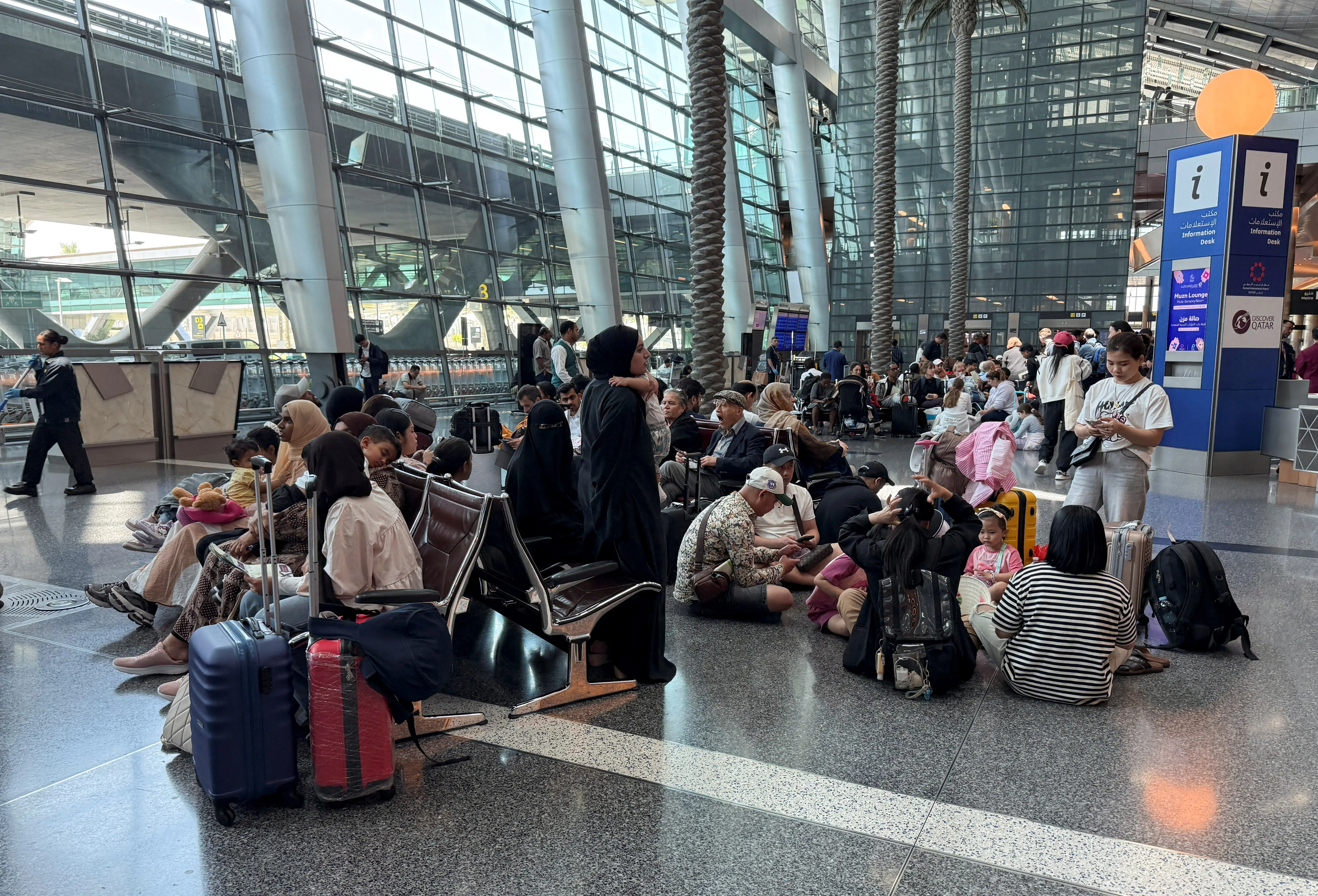 Passengers at the Hamad International Airport in Qatar on February 28.