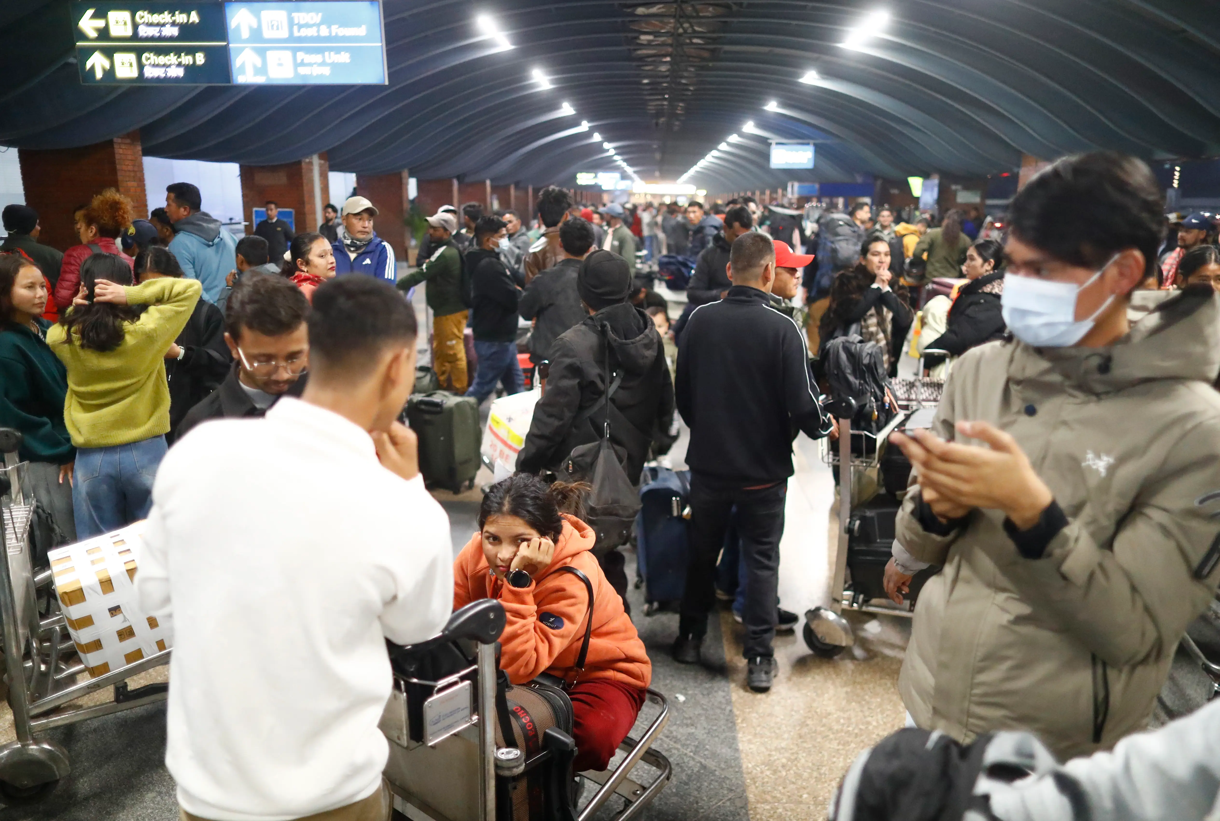 Passengers at the Tribhuvan International Airport in Nepal on February 28.