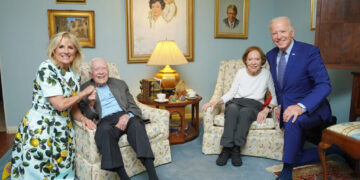 The chairs from that viral photo of the Bidens and Carters? They sold for $11K.