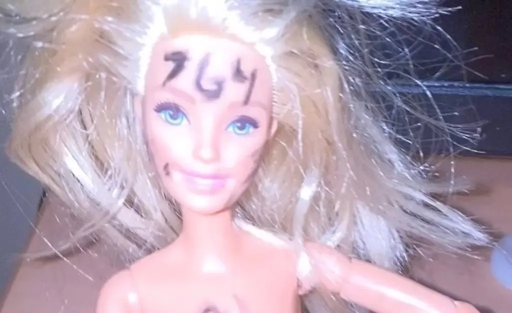 Nude Barbie doll with 