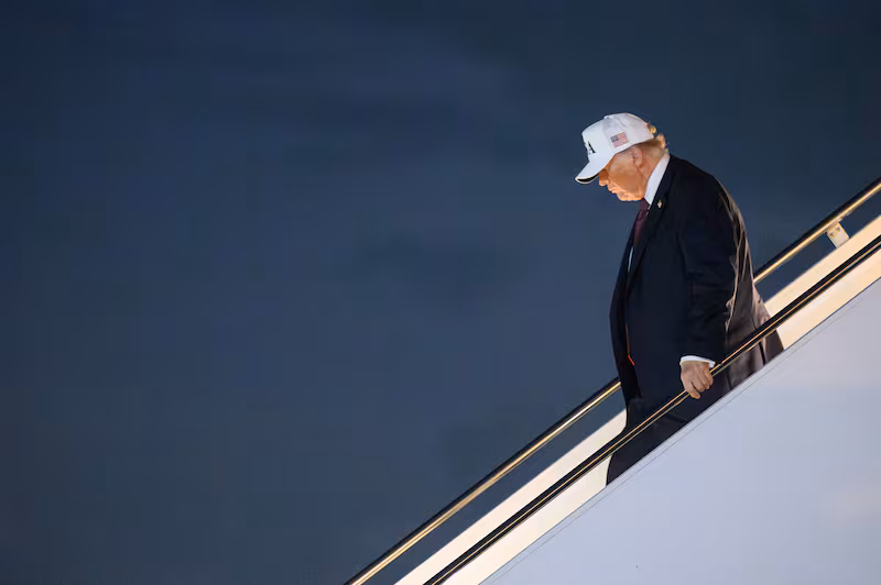US President Donald Trump steps off Air Force One at Palm Beach International Airport in West Palm Beach, Florida, on February 27, 2026. Trump is spending the weekend at his Mar-a-Lago resort. (Photo by Mandel NGAN / AFP via Getty Images)