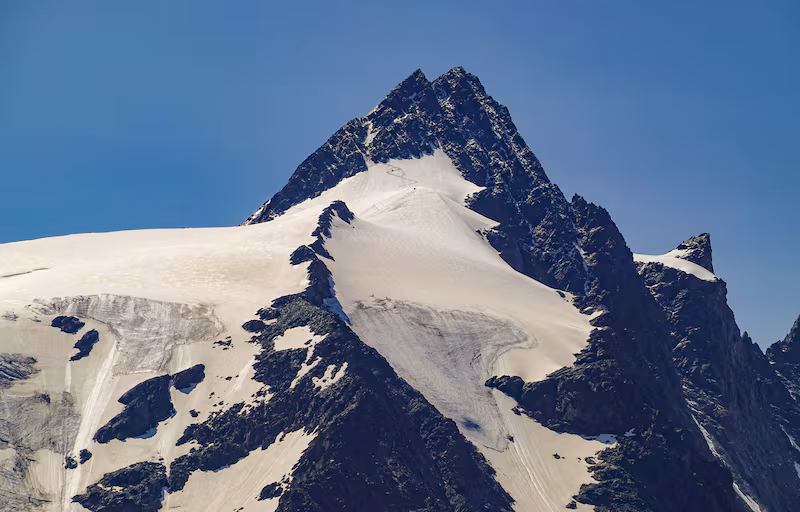 21 July 2021, Austria, Heiligenblut: The mountain Großglockner. The Großglockner is 3,798 meters high and is therefore the highest mountain in the Alpine region of Austria. It is located in the center of the largest Austrian National Park Hohe Tauern. Photo: Patrick Pleul/dpa-Zentralbild/ZB (Photo by Patrick Pleul/picture alliance via Getty Images)