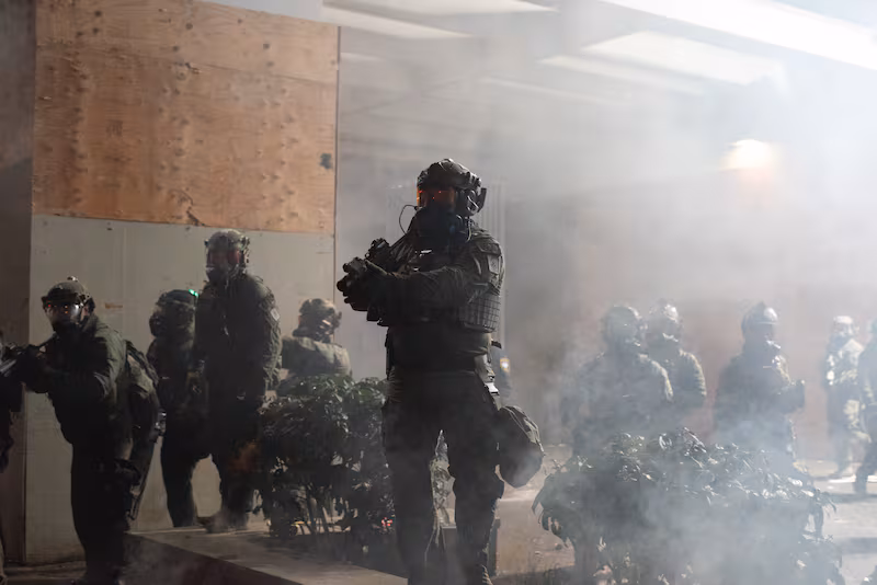 ICE deploys pepper balls, tear gas, and flashbang grenades on hundreds of people who marched from Portland City Hall to the ICE facility to protest against the agency's actions in Portland Oregon, United States on February 01, 2026.