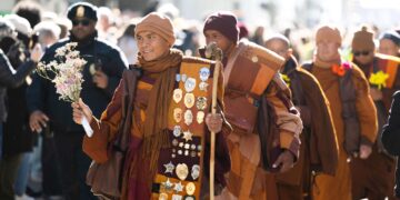 Monks walking for peace draw massive crowd in Richmond. Final stop: D.C.