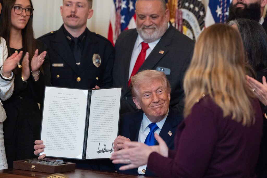 Trump again centers crime in immigration debate with White House vigil