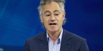 Palantir CEO Alex Karp says Trump has a point about the AI race: ‘there’s a real hesitance to adopt these kind of products in the West’