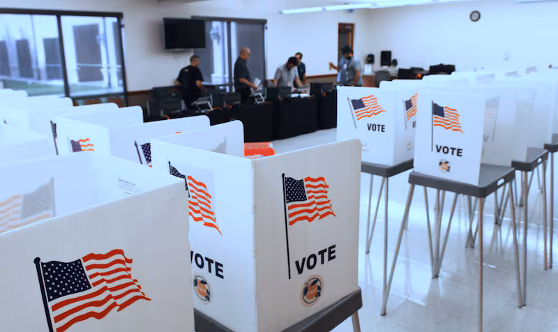 Election workers set up an early voting site at the Renaissance Senior Center in Orlando, Florida, on Nov. 5.