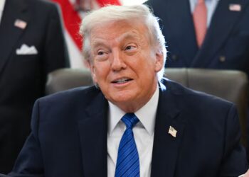 DOJ Makes Bizarre Attempt to Redact Trump’s Face in Epstein Files Photo