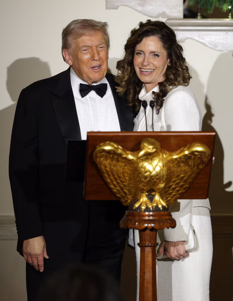 Donald Trump stands with U.S. Rep Julia Letlow at the White House on December 11.