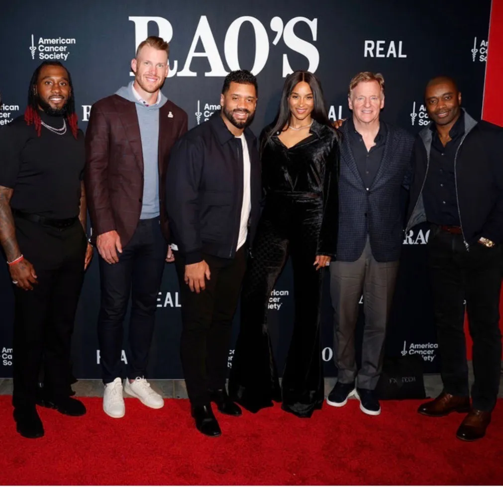 Former NFL player Kyle Rudolph, NFL quarterback Russell Wilson and his wife Ciara with NFL Commissioner Roger Goodell at Rao's.
