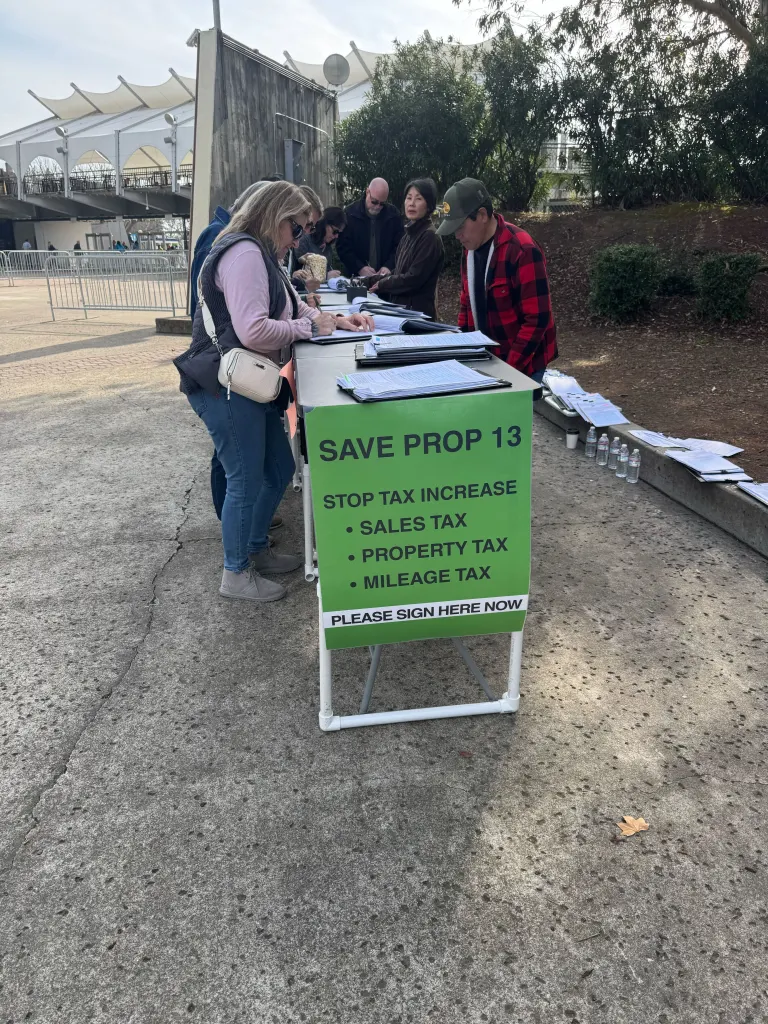 People signing a petition to 