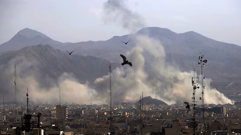 TEHRAN, IRAN - FEBRUARY 28: Smoke rises over the city center after an Israeli army launches 2nd wave of airstrikes on Iran on February 28, 2026.