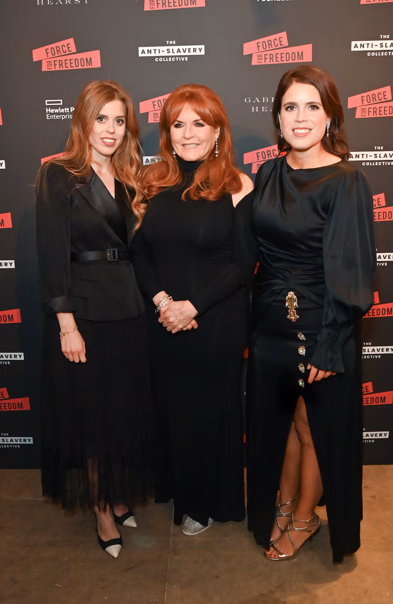 Sarah Ferguson with her daughters, Princess Beatrice and Princess Eugenie—reports suggest the princesses have sought to distance themselves from their father, Andrew, amid the Epstein files revelations.