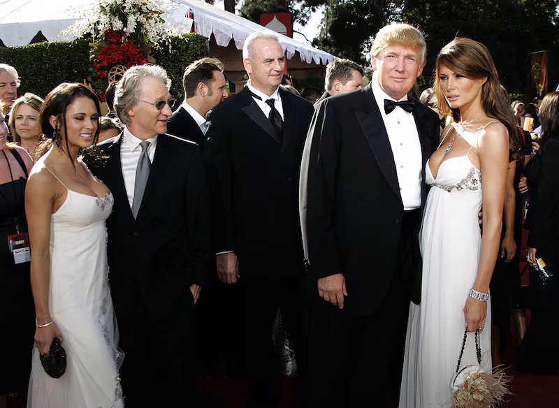 Bill Maher, Donald Trump and fiancee Melania Knauss (Photo by Dan MacMedan/WireImage)