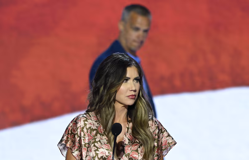 South Dakota Republican Governor Kristi Noem takes part in a sound check as political commentator Corey Lewandowski looks on at the Fiserv Forum ahead of the 2024 Republican National Convention on July 14, 2024.