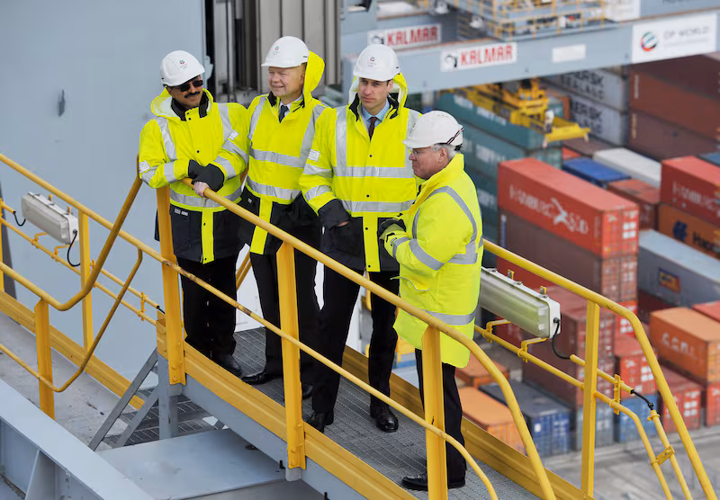 Prince William, Duke of Cambridge (second right) stands on a gantry atop one of the ship container cranes, with DP World chairman Sultan Ahmed Bin Sulayem (left), William Hague (second left) and DP World CEO Simon Moore during a visit to DP World London Gateway on March 14, 2016 in Stanford-le-Hope, in Essex.