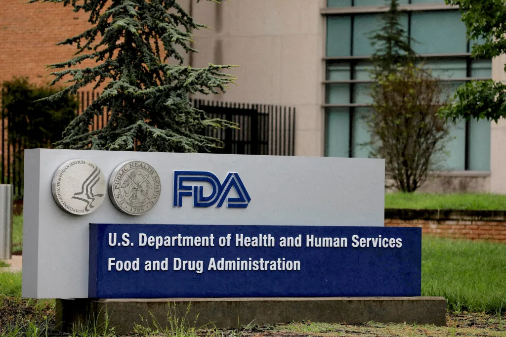 Signage for the FDA headquarters, which includes the agency's logo and full name.