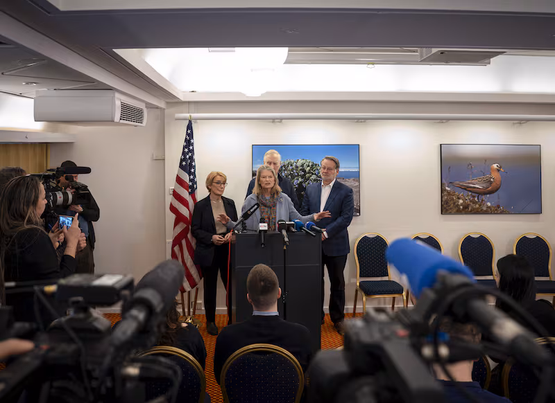 US Republican Senator Lisa Murkowski (C) speaks to the press next to US Democrat Senator Maggie Hassan (L) and US Democrat Senator Gary Peters during a press conference in Nuuk, Greenland, on February 9, 2026. A delegation of United States senators visited Greenland February 9, 2026 to 