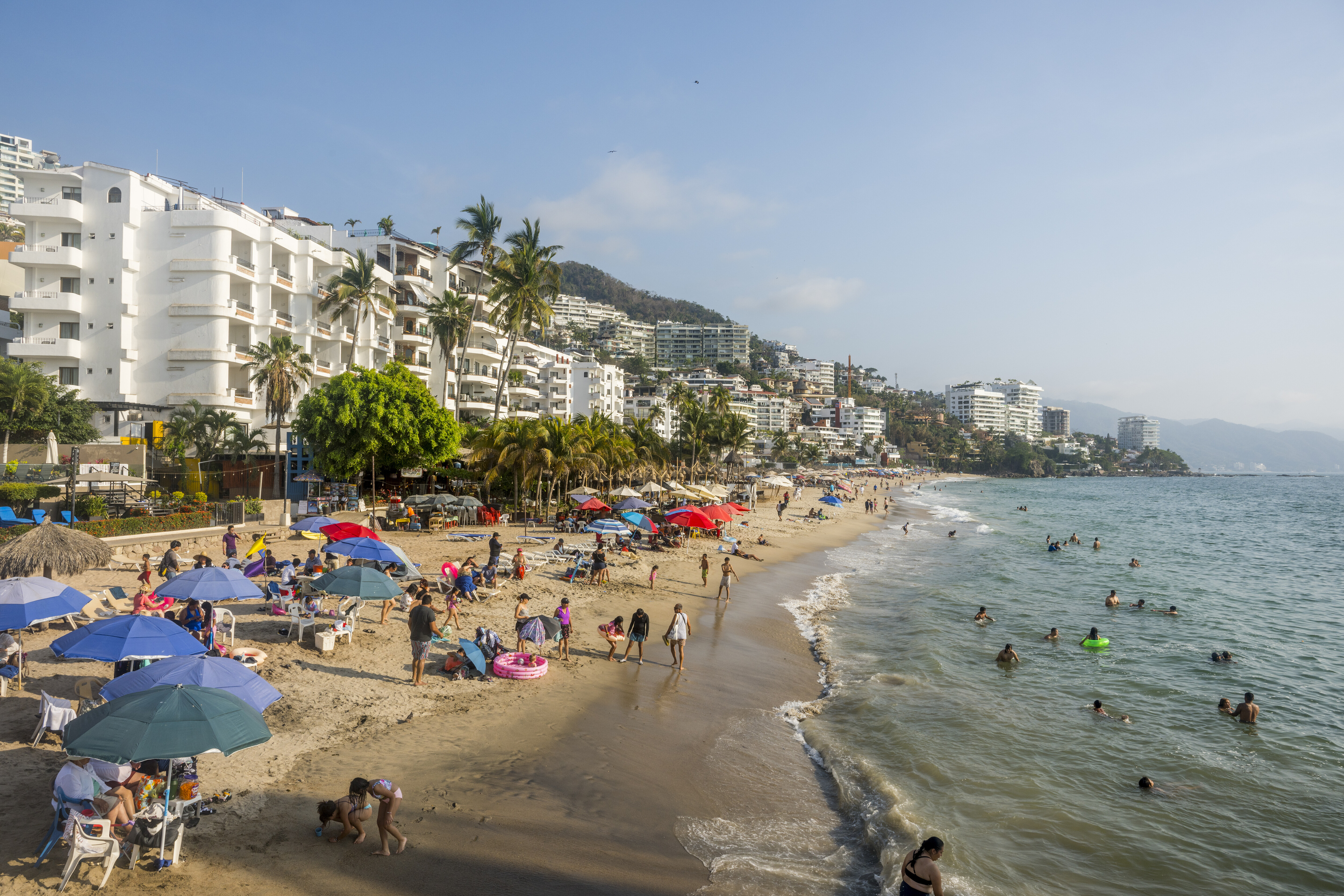 MEXICO - 2025/04/28: Beach scene at the Playa de los Muertos in the Romantic Zone of Puerto Vallarta, also known as Viejo Vallarta (Old Town) or Zona Romantica, in Puerto Vallarta, Jalisco state, Mexico. (Photo by Wolfgang Kaehler/LightRocket via Getty Images)