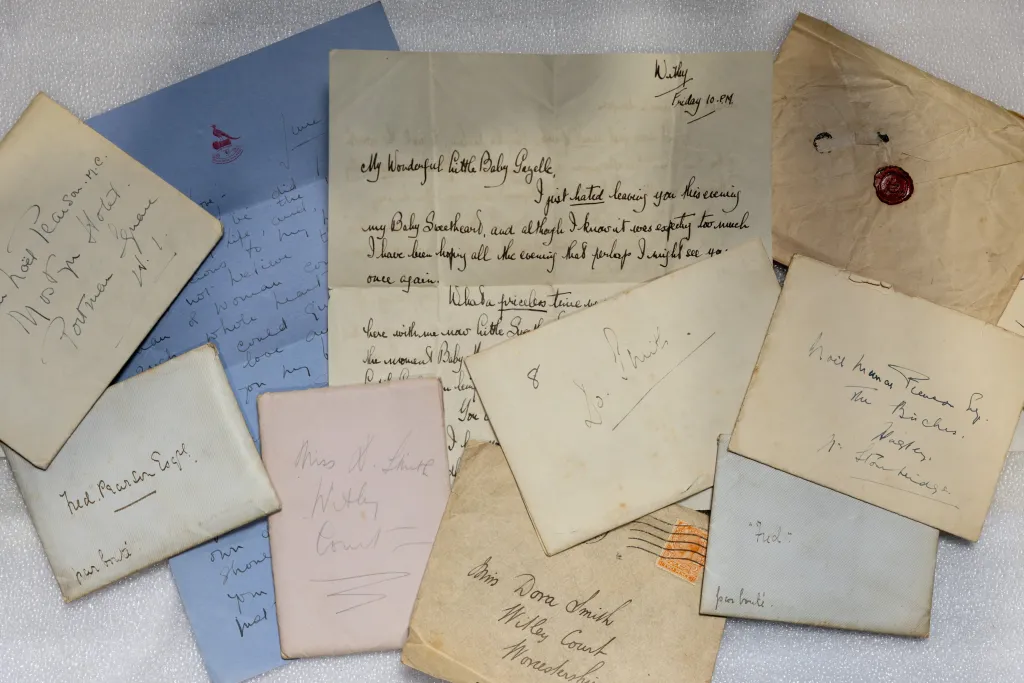 Lost love letters with handwritten envelopes and messages.